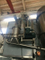 Sistema de procesamiento de secado de granulación de preparación sólida completamente cerrado